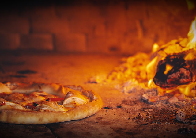 Wheels on Fire Pizza Truck_ Hot Pizza Delivered Near You