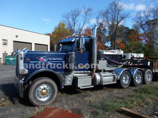 Tri Axle Heavy Haul Trucks for Sale _ Find Your Rig Today