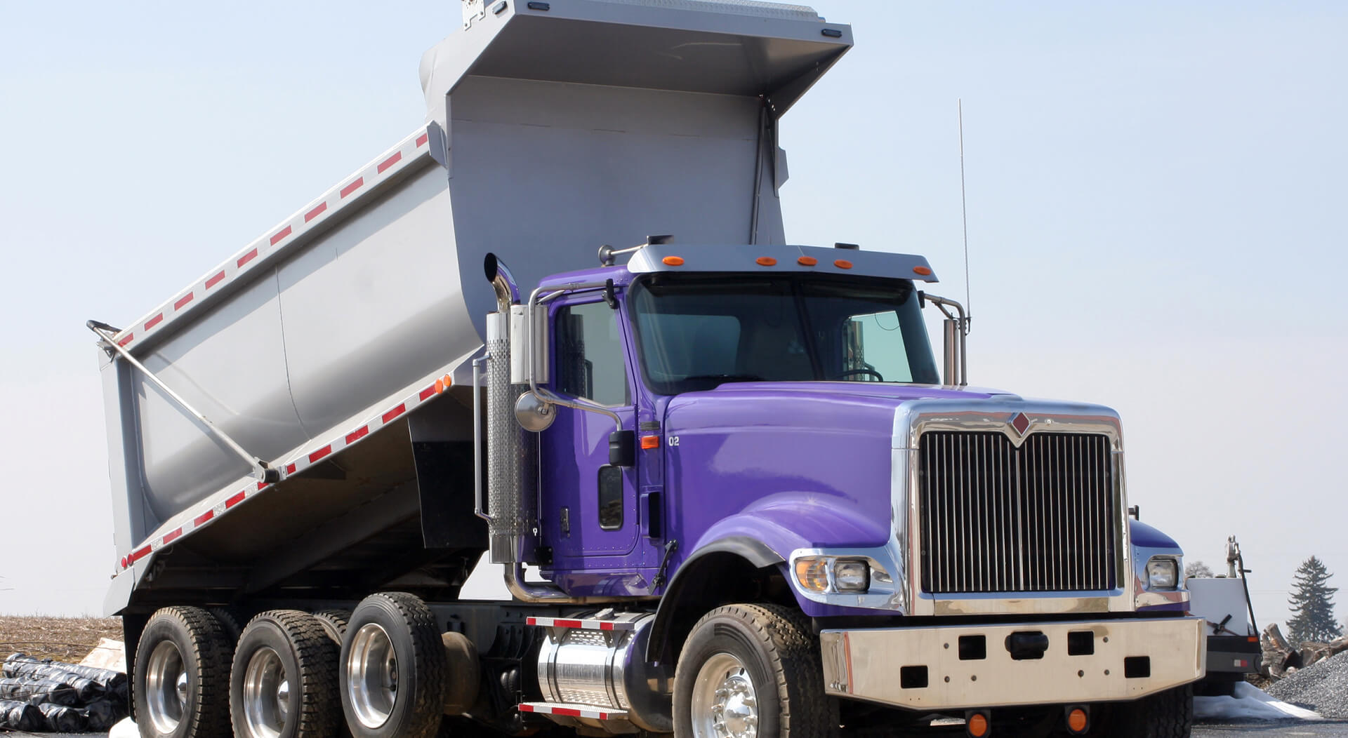 Top 5 Benefits of Buying a Repossessed Tri Axle Dump Truck